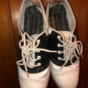 Black and white saddle shoes